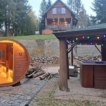 Domek alpejski Dom Na Mazurach Zatoka Leśna Winiec